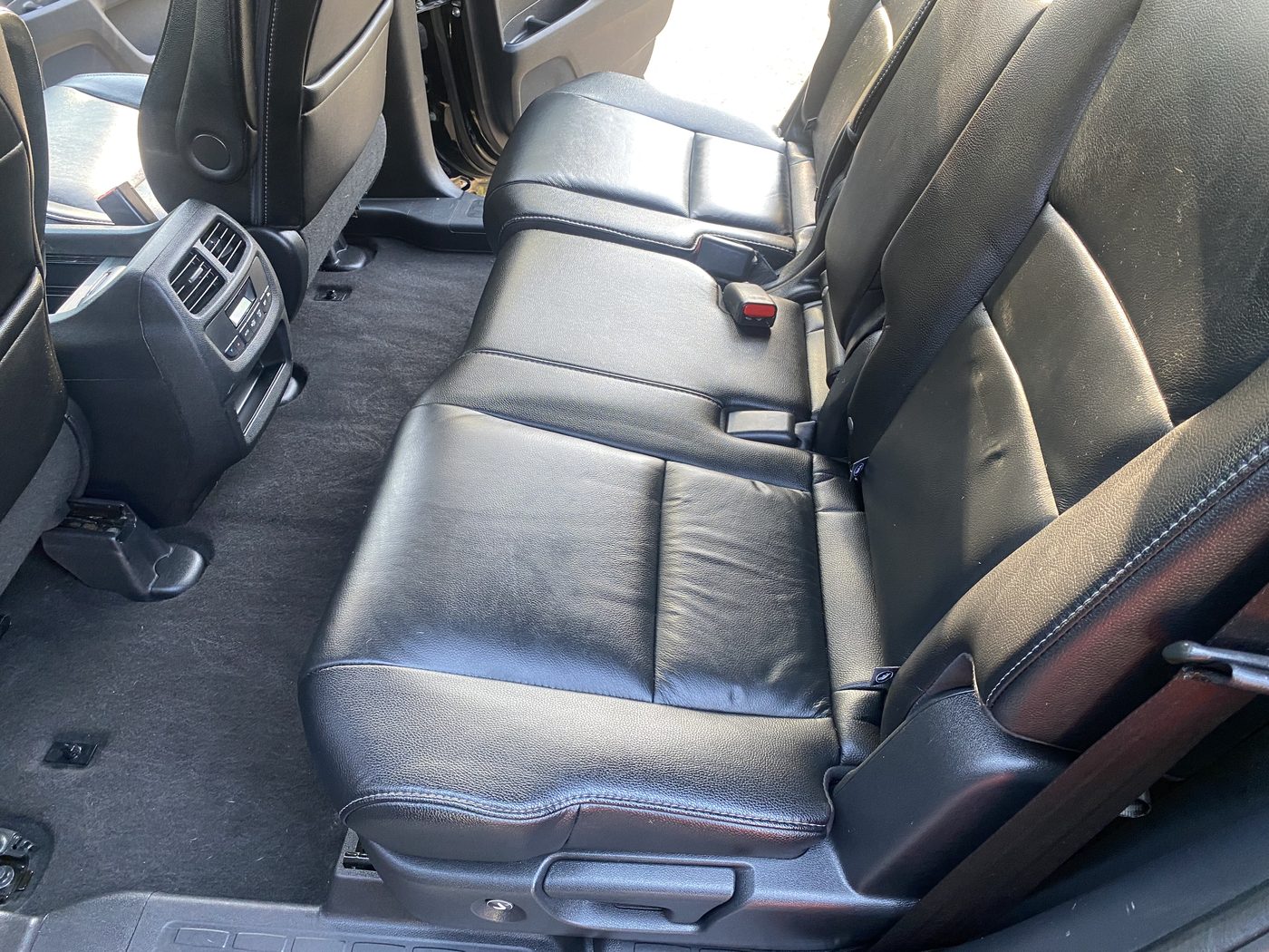 Cleaned black leather rear seats